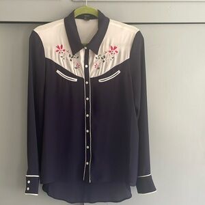 “Vintage” looking cowboy shirt.